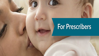 Mom kissing her baby